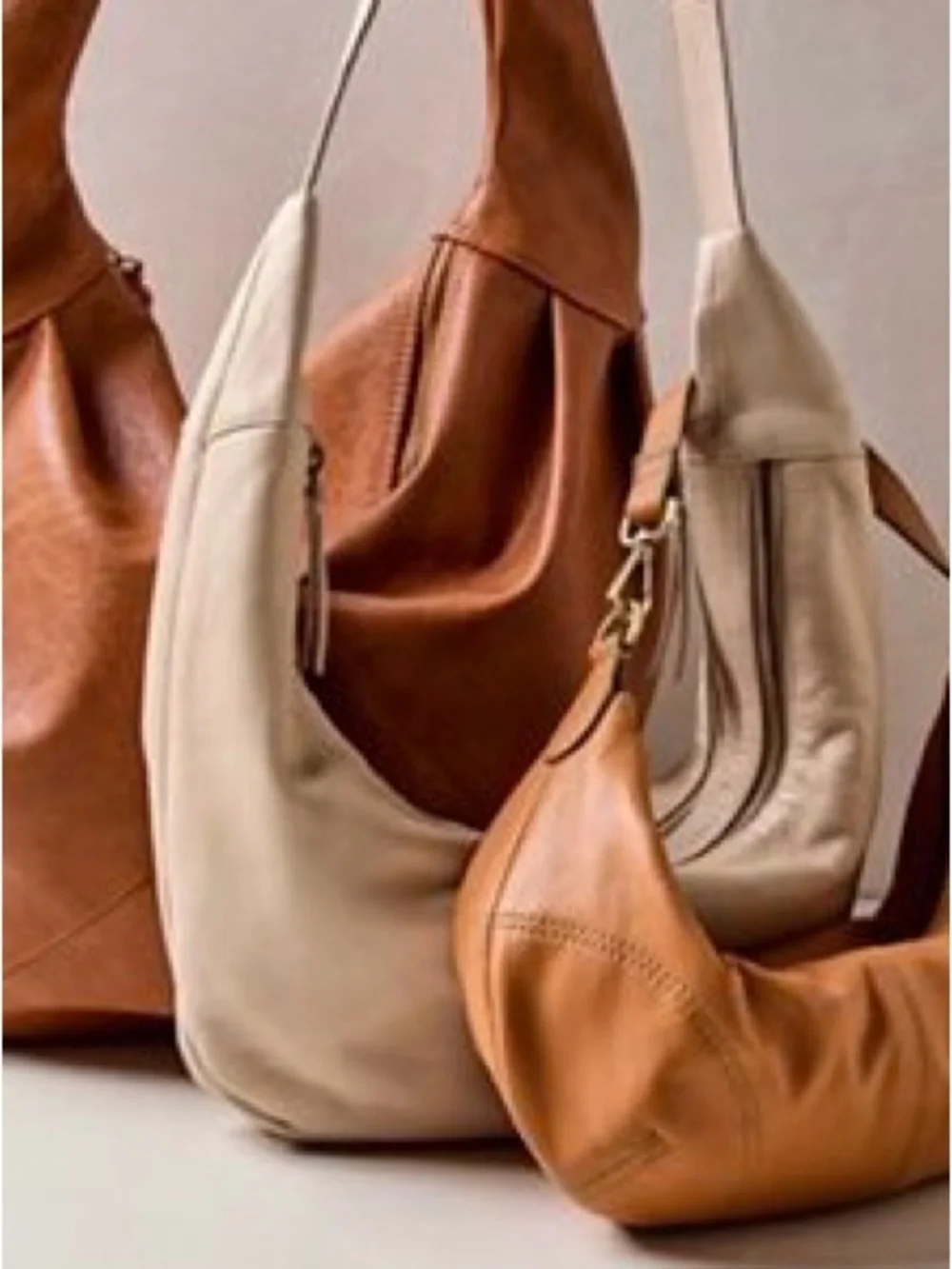 Free People Idle Hands Sling Bag in Mineral Cream Leather/ Brushed Silver